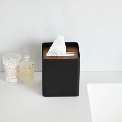 Front view of black Tissue Case on sink countertop by Yamazaki Home.