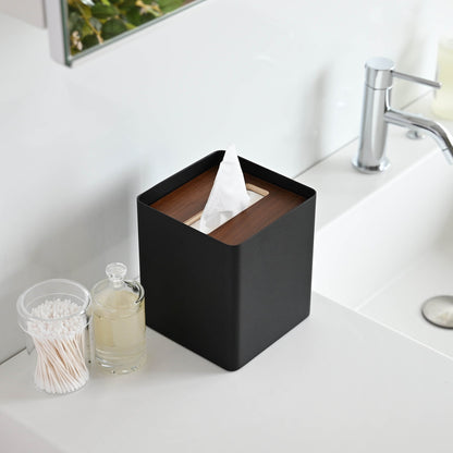 Aerial view of black Tissue Case on bathroom sink countertop by Yamazaki Home.
