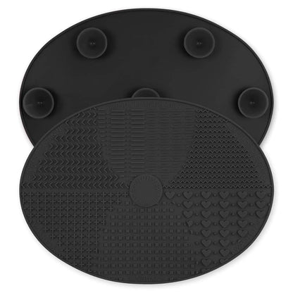 Black silicone brush cleaning mat with 7 textured zones and suction cups for hands-free makeup brush washing