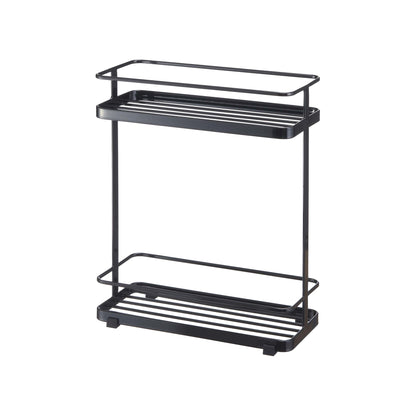Black metal two-tier shelf on a white background