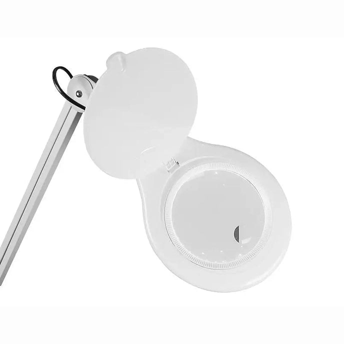Close-up of Ikonna 5x magnification lamp head with open hinged cover and silver arm