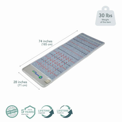 Top-down view of 74x28 inch HealthyLine Platinum Aura Pro Plus mat with dimensions and warranty icons