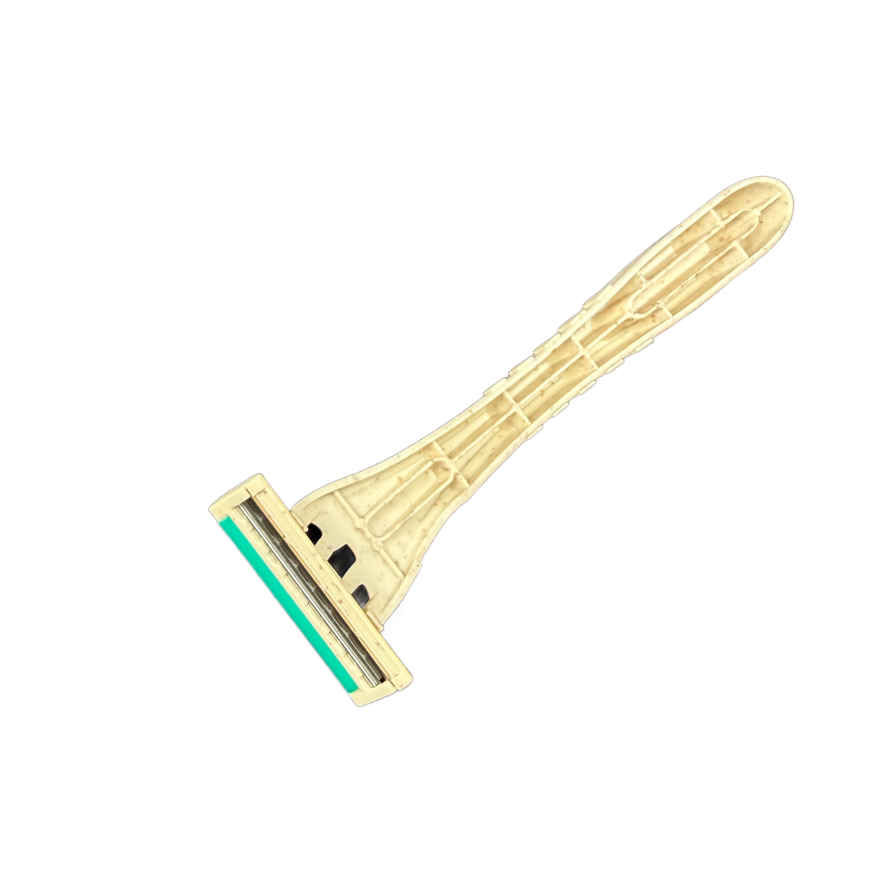 Angled view of the Tess wheat straw pivot head razor showing the triple blade cartridge and lubricating strip
