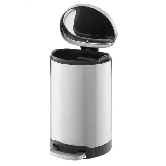 Open stainless steel step-on waste bin showing interior liner and hinge