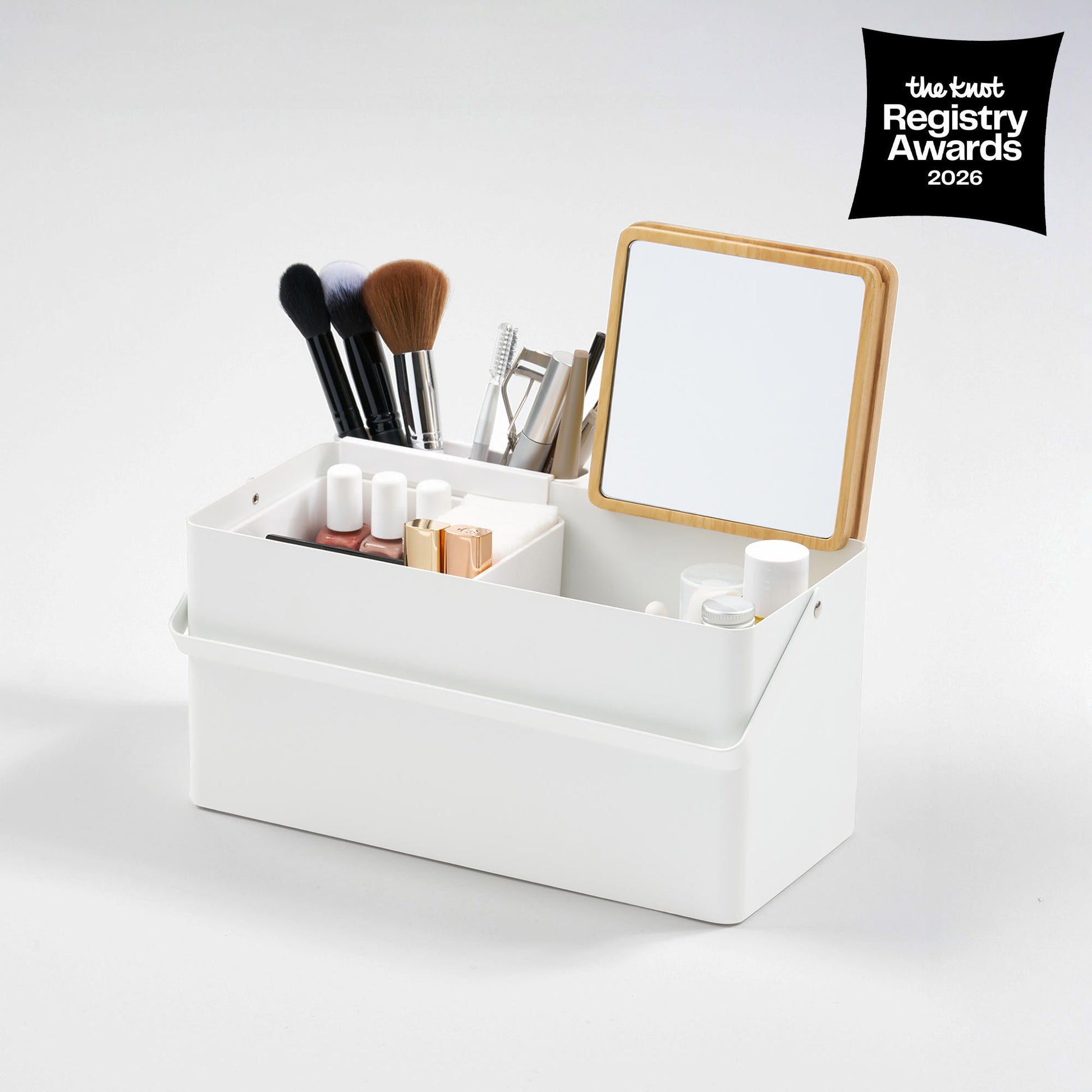 Makeup Organizer with Mirror in White with props on the white background, having the knot awards logo on the upper right.