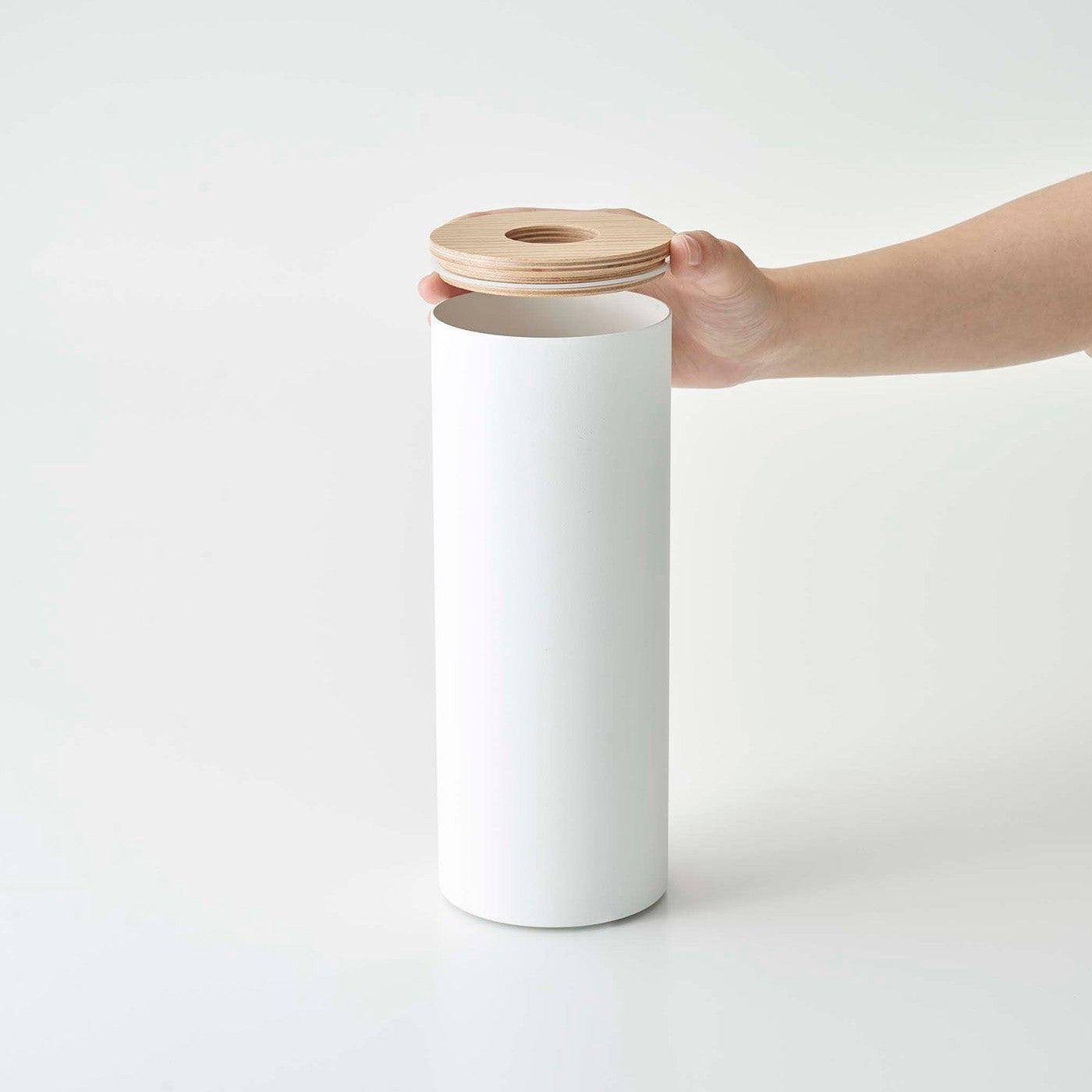 Top of Large White Yamazaki Home Round Tissue Case being removed