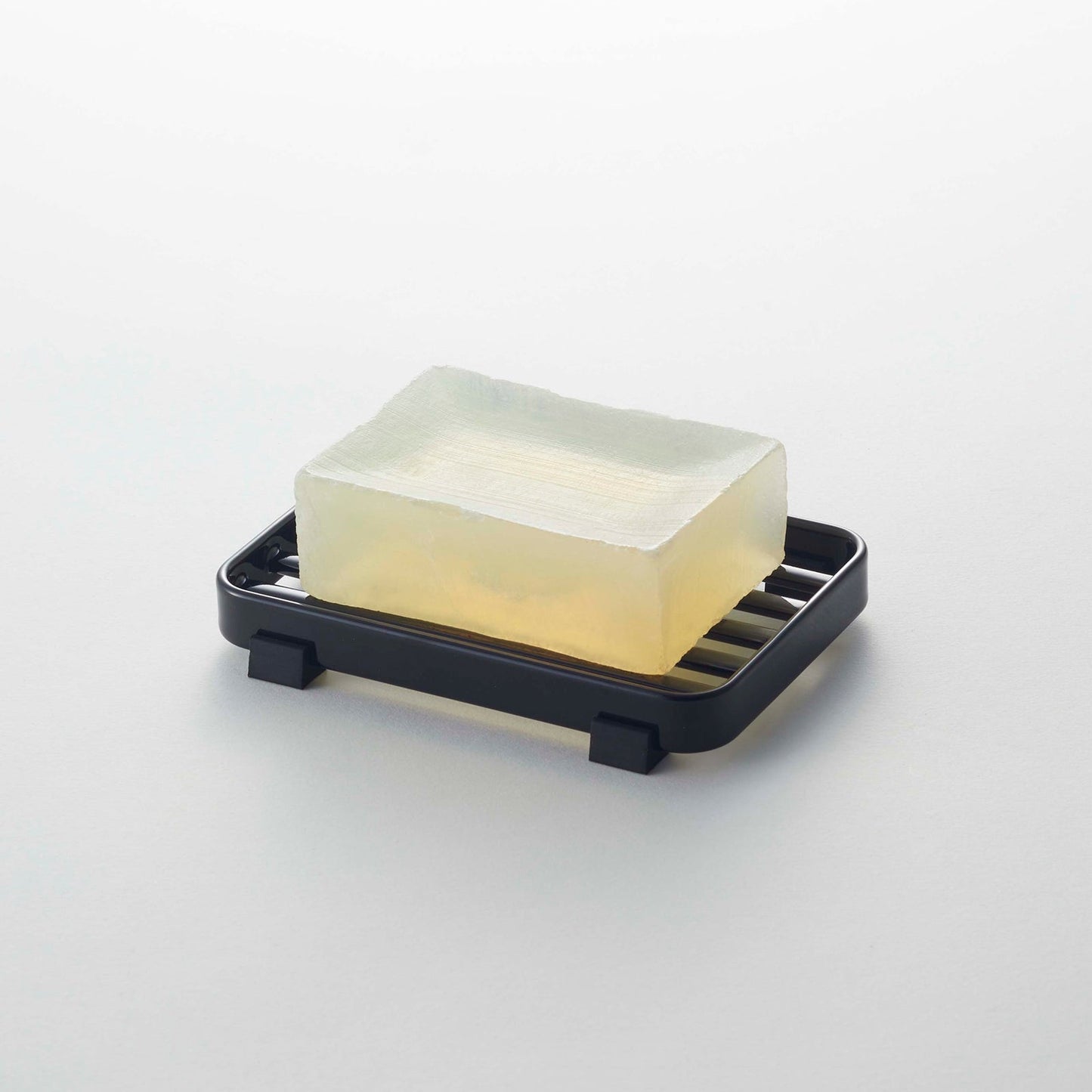 Prop photo showing Slotted Soap Tray with various props.