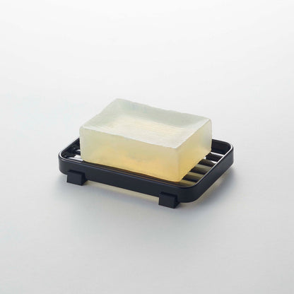 Prop photo showing Slotted Soap Tray with various props.