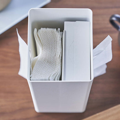 Close up top-down view of opened white Yamazaki Two-Sided Tissue Case on a table