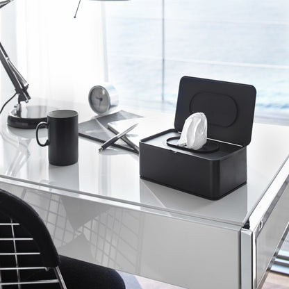 Open black Wet Tissue Case on office desk by Yamazaki Home.