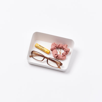 Yamazaki Home Vanity Tray - Angled - Two Sizes with props, set against a white background.
