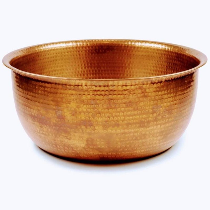 Hand-hammered copper pedicure bowl with textured dimpled finish