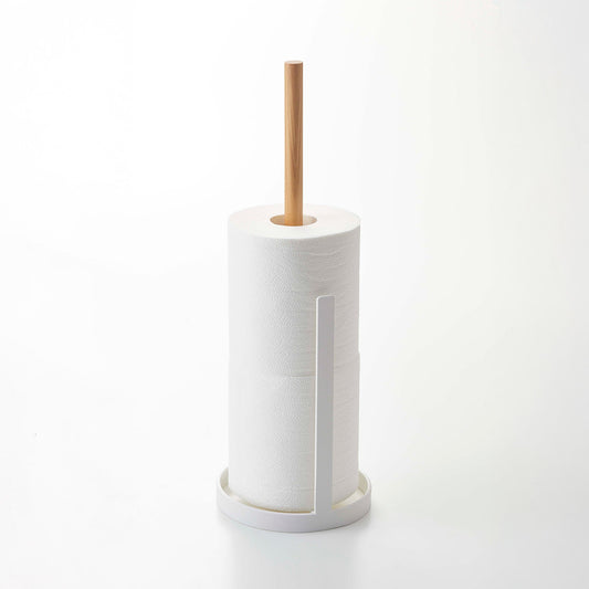 Toilet Paper Stocker with two rolls of toilet paper against a white background by Yamazaki Home.
