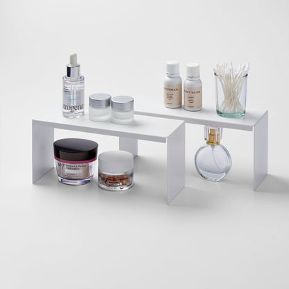 Yamazaki Home Medicine Cabinet Riser [Set of 2] with props, set against a white background.