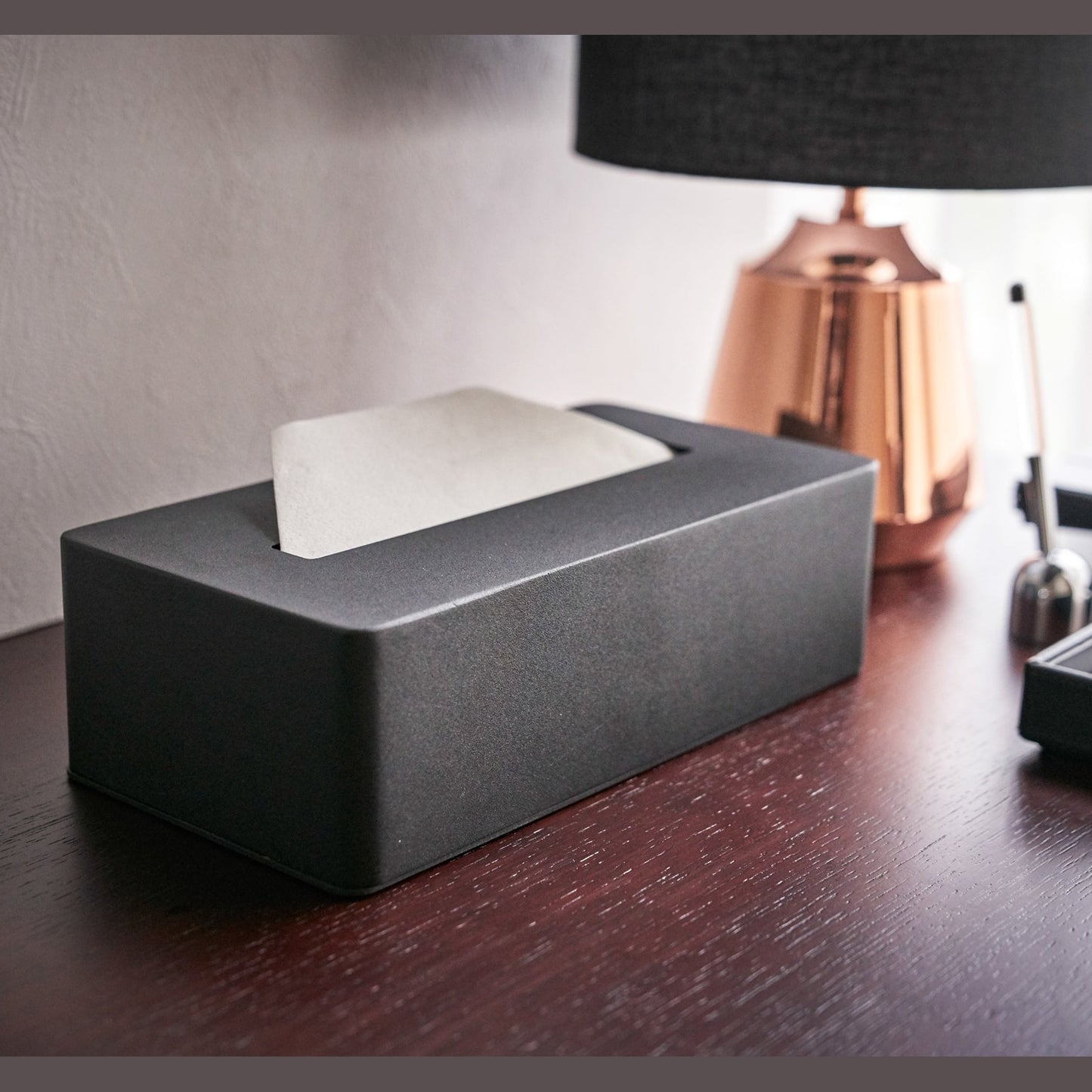 Black Tissue Case on desk countertop by Yamazaki Home.
