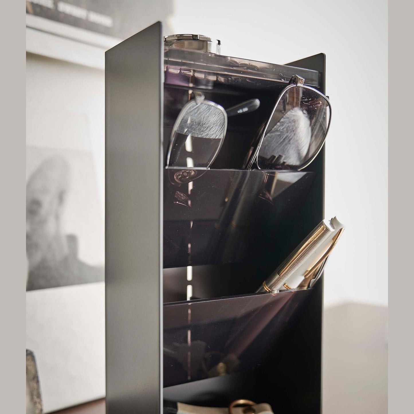 Close up of black Yamazaki Home Accessory Organizer holding accessories