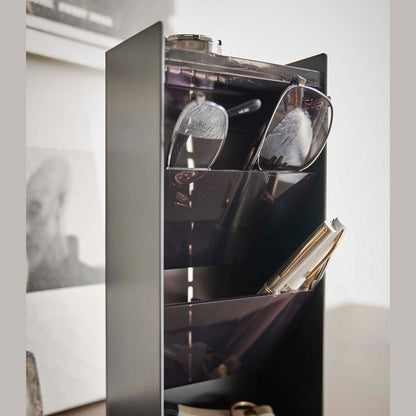 Close up of black Yamazaki Home Accessory Organizer holding accessories