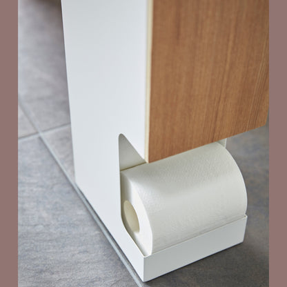 Close up bottom view of Toilet Paper Stock dispensing toilet paper roll by Yamazaki home.