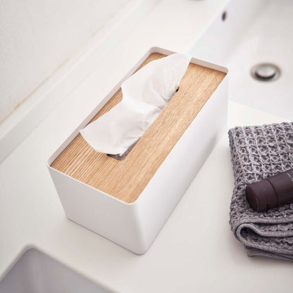 Close up side view of white Tissue Case by Yamazaki Home.