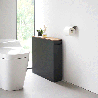 Gif of black Yamazaki Home Pull-Out Bathroom Storage Cabinet opening and closing