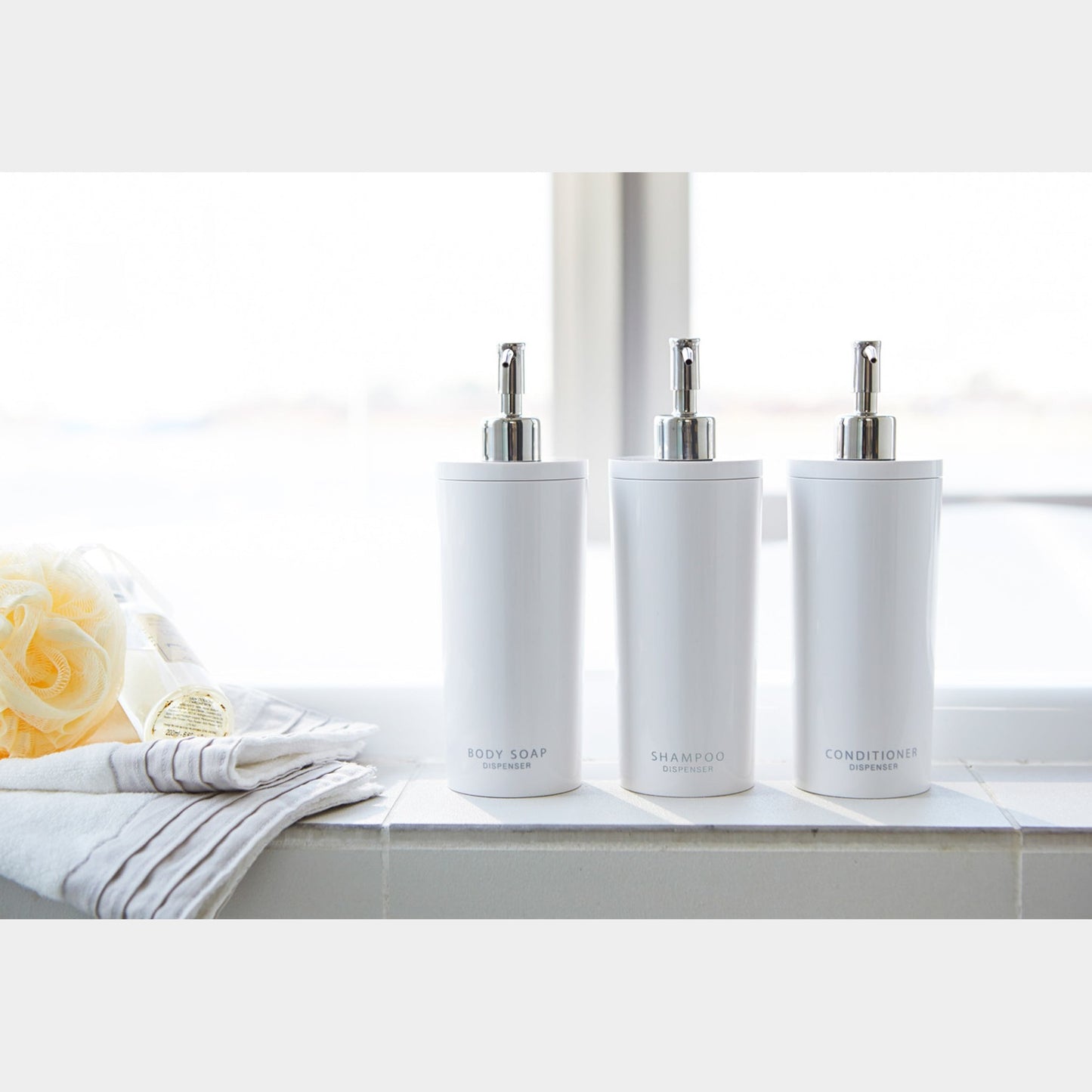 Front view of Body Soap Dispenser in bathroom by Yamazaki Home.