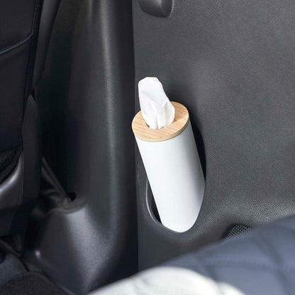 Small white Yamazaki Home Round Tissue Case in a car door cup holder