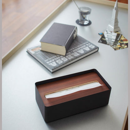 Aerial view of black Tissue Case on desk by Yamazaki Home.