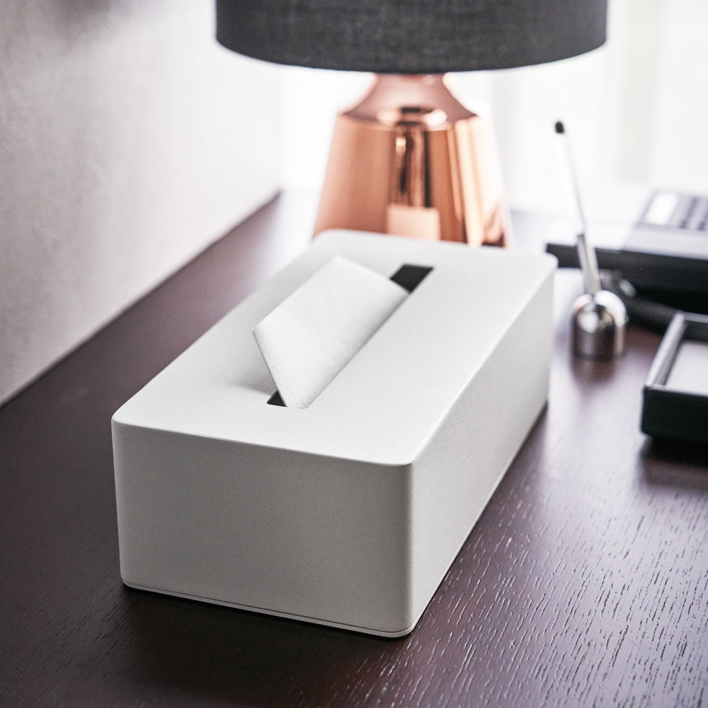 Side view of white Tissue Case on desk by Yamazaki Home.