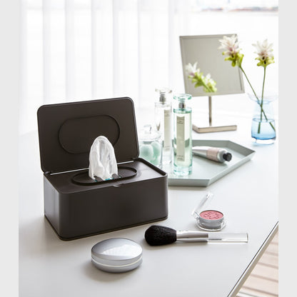 Black Wet Tissue Case on vanity countertop by Yamazaki Home.