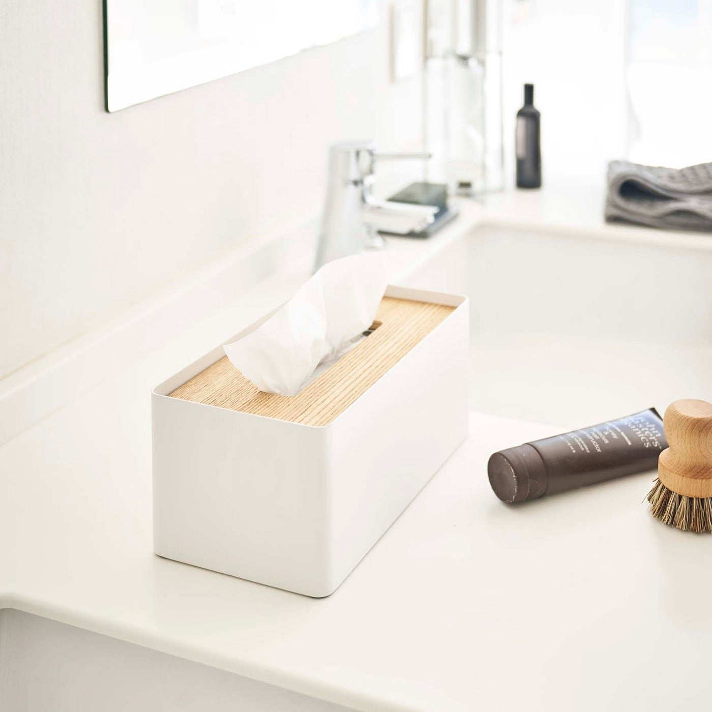 White Tissue Case holding tissues by Yamazaki Home.
