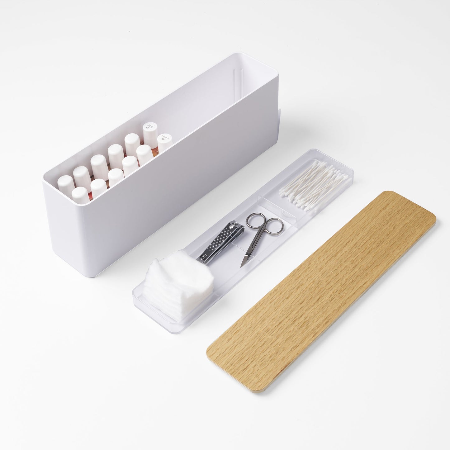 Yamazaki Home Nail Polish Organizer with props, set against a white background.