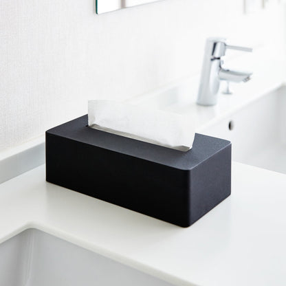 Black Tissue Case on bathroom sink countertop by Yamazaki Home.
