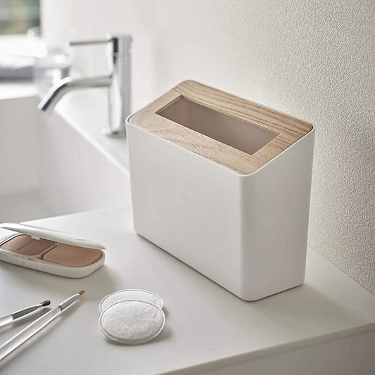 White Countertop Waste Bin on bathroom sink countertop by Yamazaki Home.