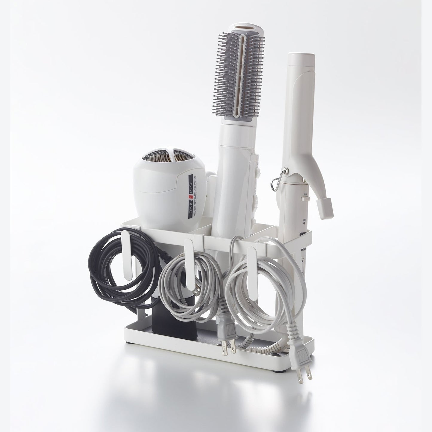 Prop photo showing Haircare Appliance Holder with various props.