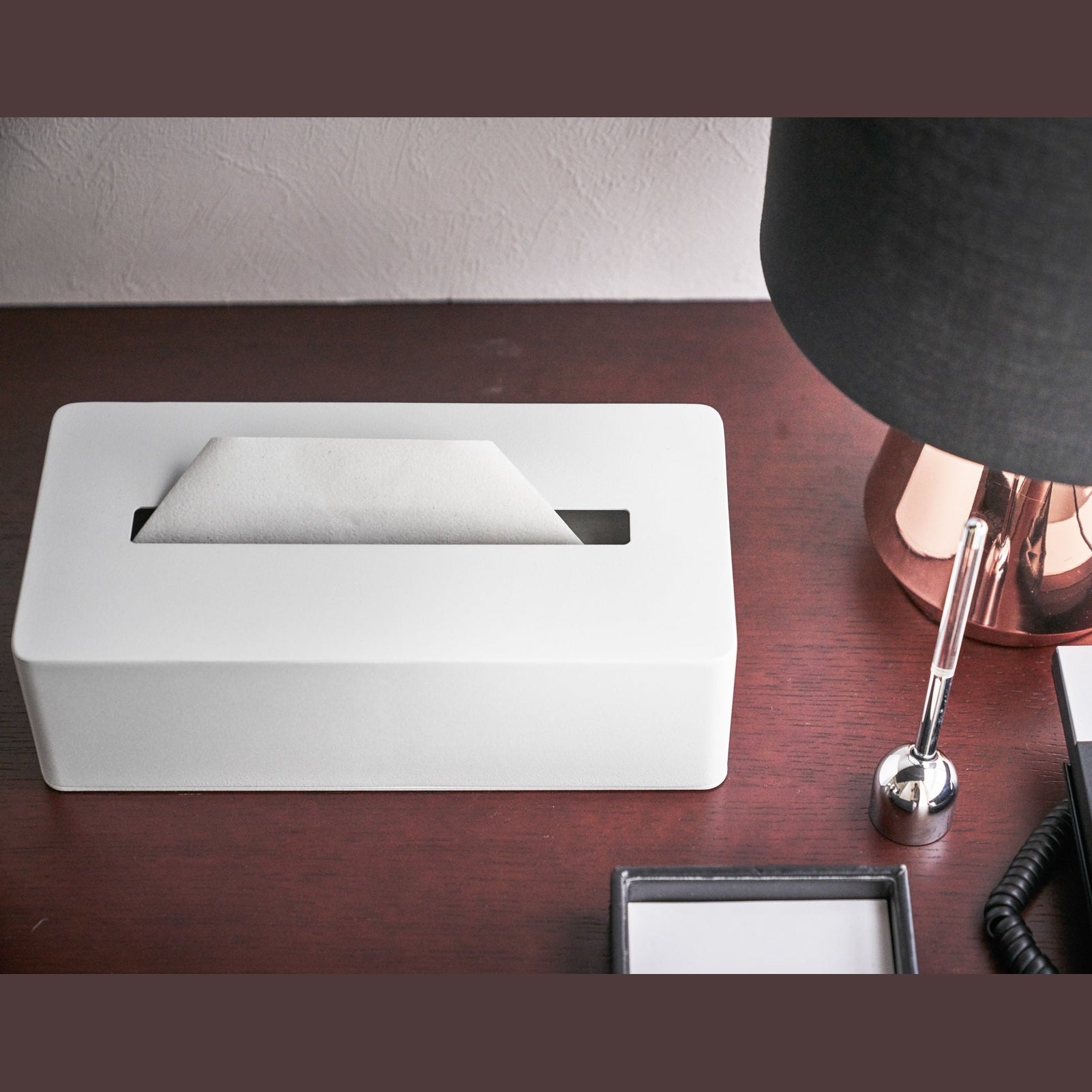 Aerial front view of white Tissue Case on desk by Yamazaki Home.