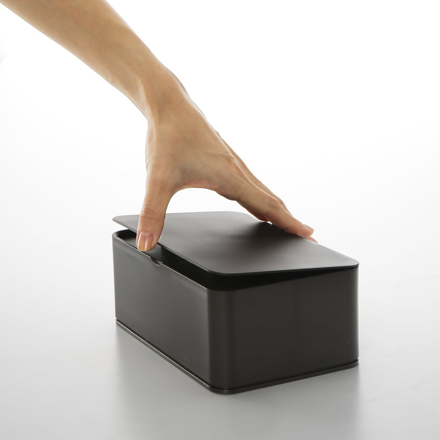 Black Wet Tissue Case on white background by Yamazaki Home.