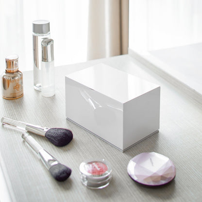 Closed white Skincare Organizer on vanity by Yamazaki Home.