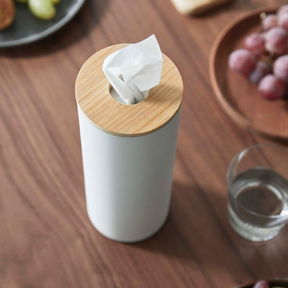 Close up of Large White Yamazaki Home Round Tissue Case on a dining table